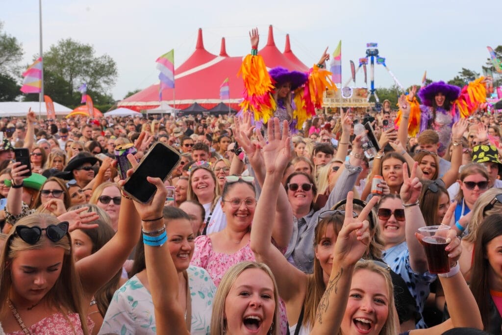 Faces of people in the audience at a show at Meridian Showground